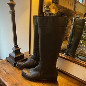 Genuine Black leather Stuart Weitzman riding boots. Lite scuffing on toe area.